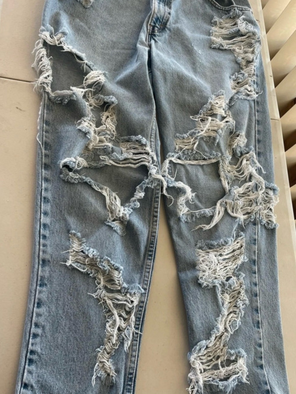 Levi's Light Blue Heavily Distressed Boyfriend Jeans